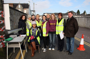 The Administrators: Members of the organising group pictured as they awaited the return of the runners, joggers and walkers at last year's Muire Gan Smál 5K Fundraiser. With the seated, Colette Mallon are: Eilis O'Leary, Annie Murphy, Tina Donovan, Noeleen O'Connor, Sheila McCarthy, Maure Browne, deputy principal; Caroline Martin and Tim Nelligan. ©Photograph: John Reidy  24-2-2013