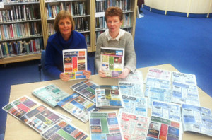 Gina McElligott handing over the complete collection of In & About Castleisland to Eileen Murphy - who accepted on behalf of the Kerry County Council Library Service. Photograph Courtesy of 'The Library' .