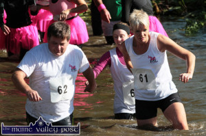 Pressing on: the MLFitness Team of Martin Flannery, Emma Ward and founder, Maggie Large getting through the cold , spring water of the River Maine during the HercOileán Challenge in Castleisland on Octomer 11th. ©Photograph: John Reidy