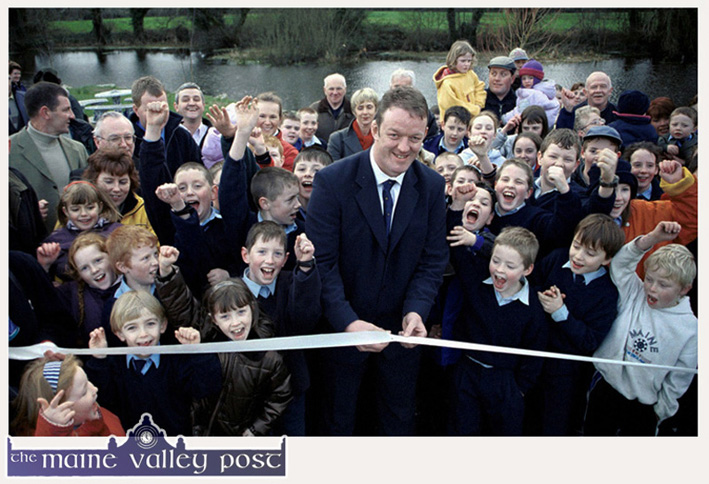 International Rugby hero, Mick Galwey is  surrounded by a horde of enthusiastic neighbours as he cuts the tape to officially open the Kileentierna Wildlife Park in his native village of Currow. ©Photograph: John Reidy 15-12-2000