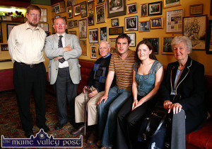 Traditional singer, Jimmy O'Brien pictured in the Killarney pub which carried his name - with RTE Radio presenter, Peter Browne. Included are seated: Paddy Cronin, Paudie O'Connor, Aoife Ní Chaoimh and Connie Cronin. ©Photograph: John Reidy 10-9-2006