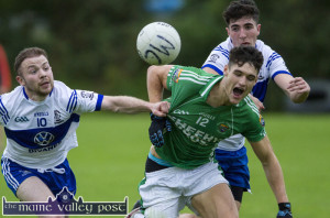 Milltown/Castlemaine wing forward, Gavin Horan is dispossessed by the combined efforts of Desmonds wing-forward, Seán Lynch and corner-back, Luke Lyons during their Co. League Division 1 Round 10 game in Castleisland on Saturday evening. ©Photograph: John Reidy